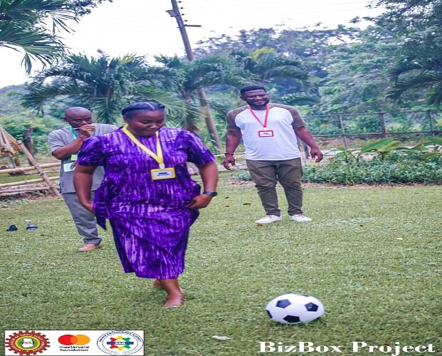 Outdoor field activity with participants running a practical team exercise